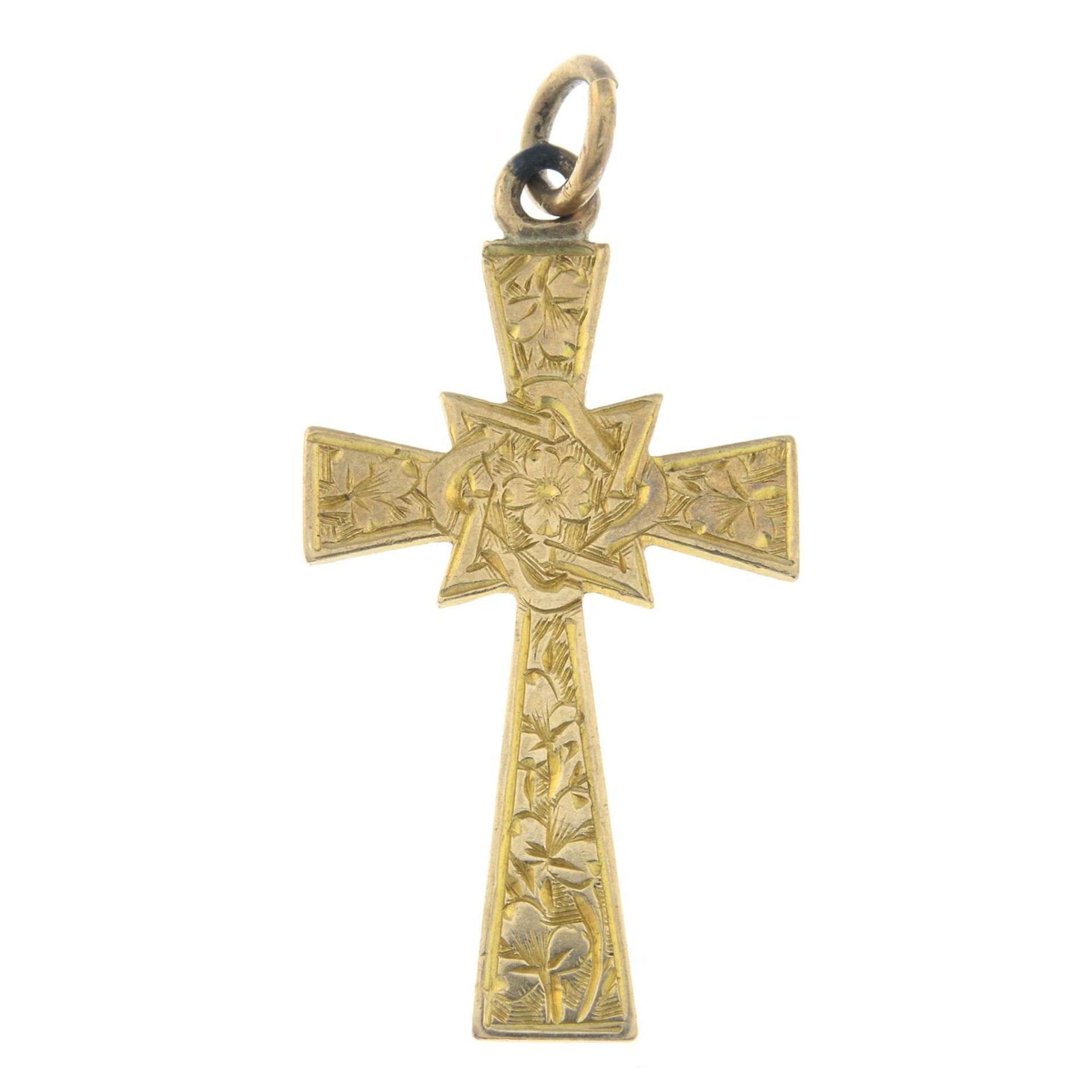 An Edwardian 9ct gold engraved floral motif cross pendant.