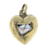 An Edwardian pendant, depicting an enamel letter and a heart-shape letter box.