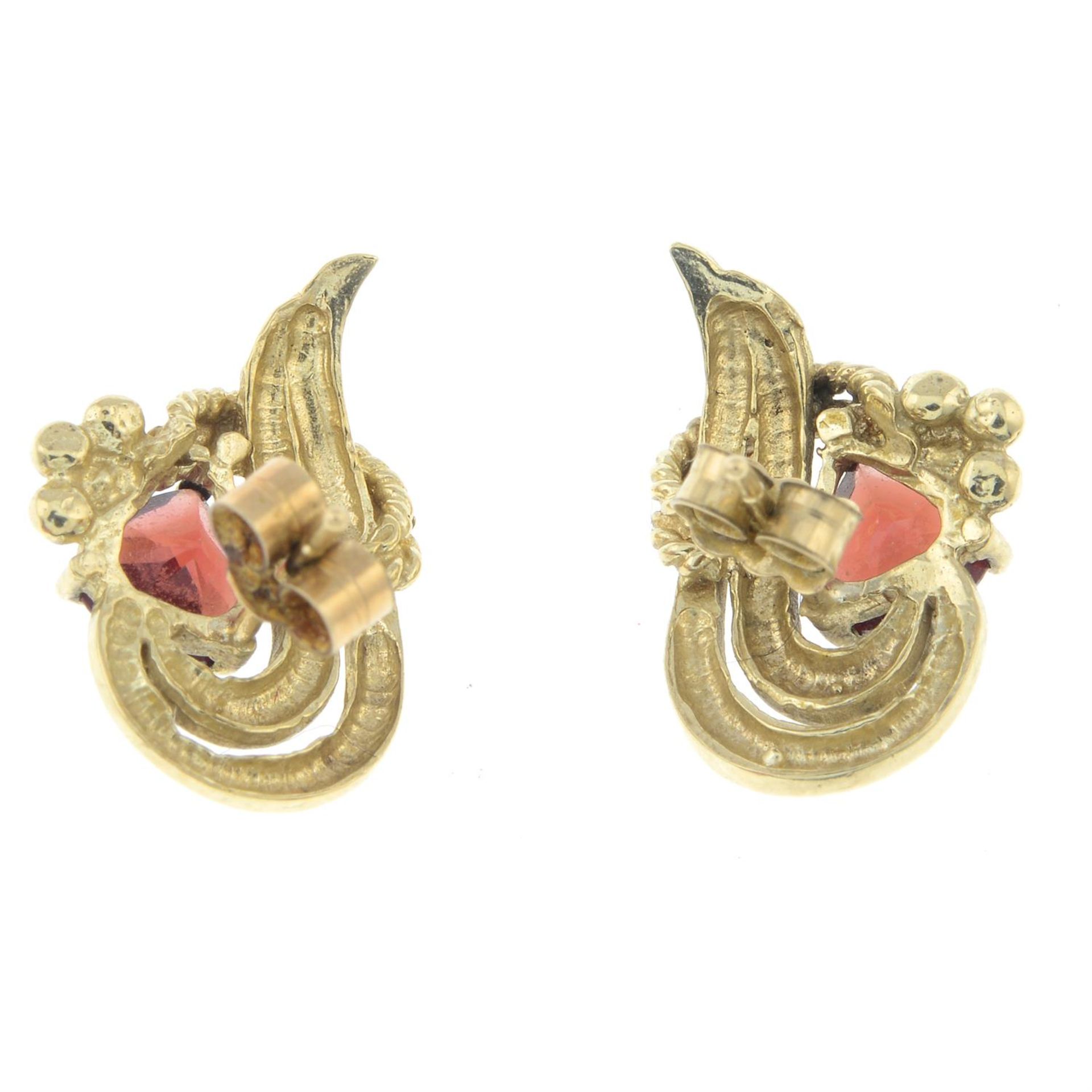 A pair of 9ct gold garnet earrings. - Image 2 of 2