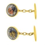 A pair of early 20th century carved rock crystal reverse intaglio cufflinks, each depicting a