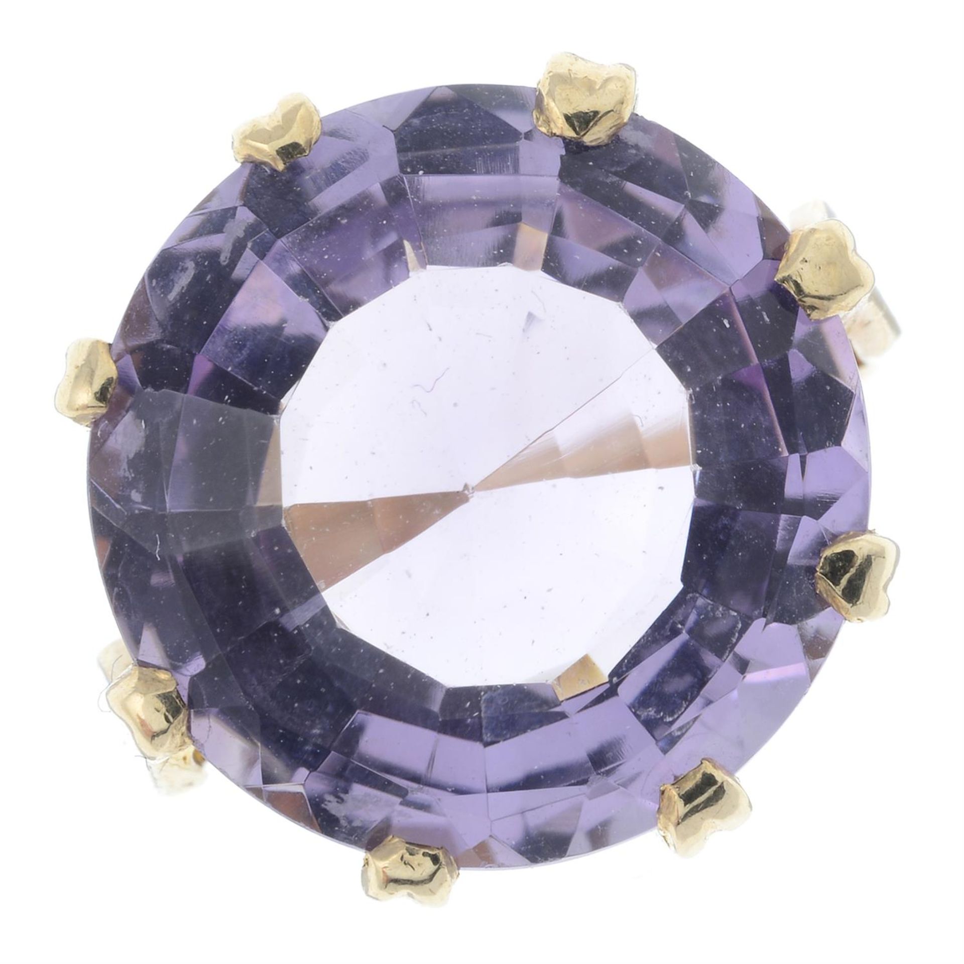 An amethyst single-stone ring.