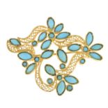 A reconstituted turquoise brooch.