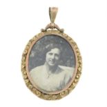 An early 20th century double portrait miniature locket.