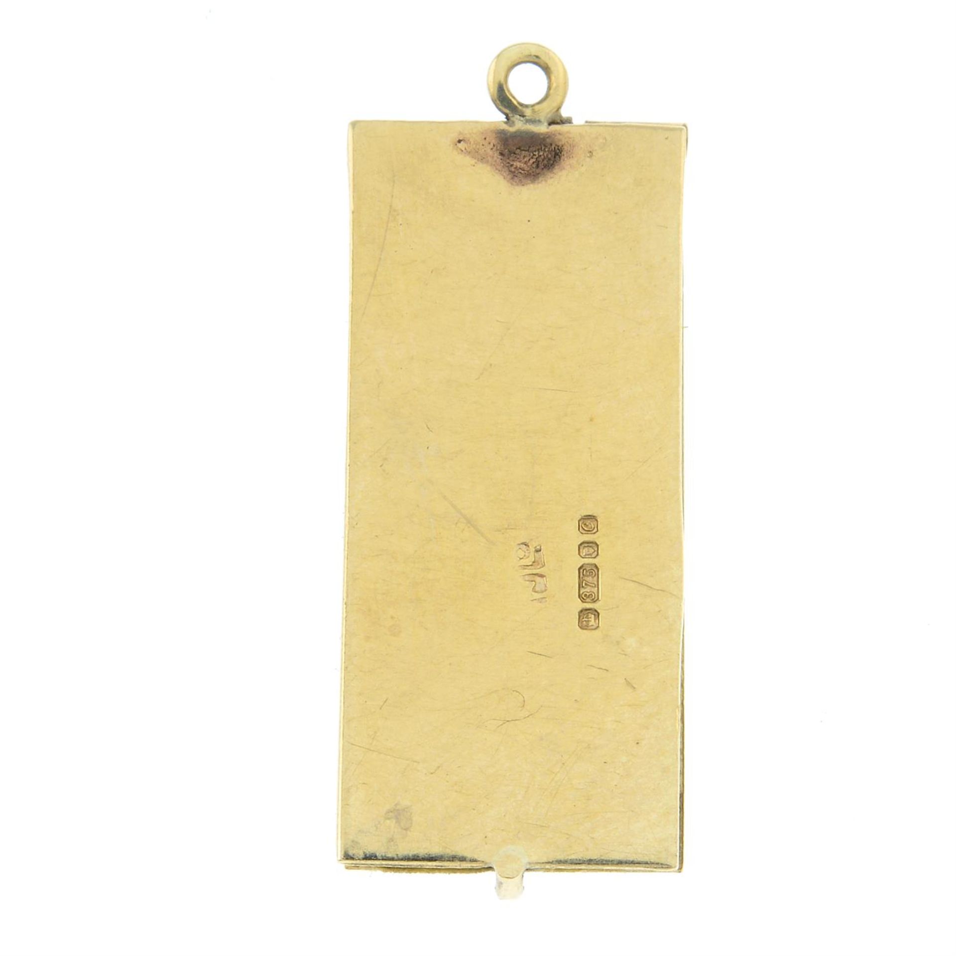 A late 20th century 9ct gold cheque book charm. - Image 2 of 2