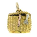 A 9ct gold fisherman's basket charm.