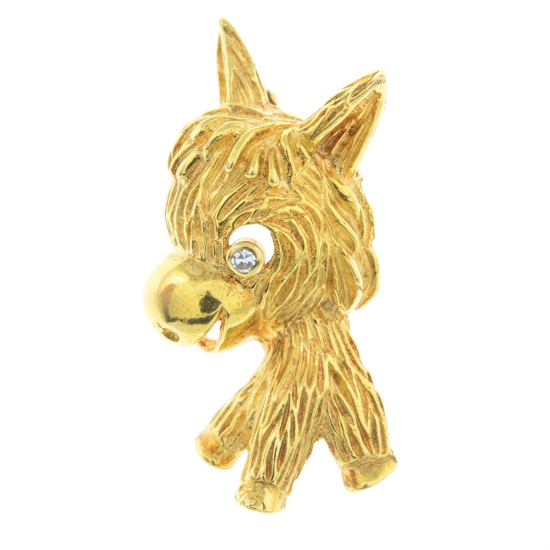 A textured donkey brooch, with diamond eye detail.