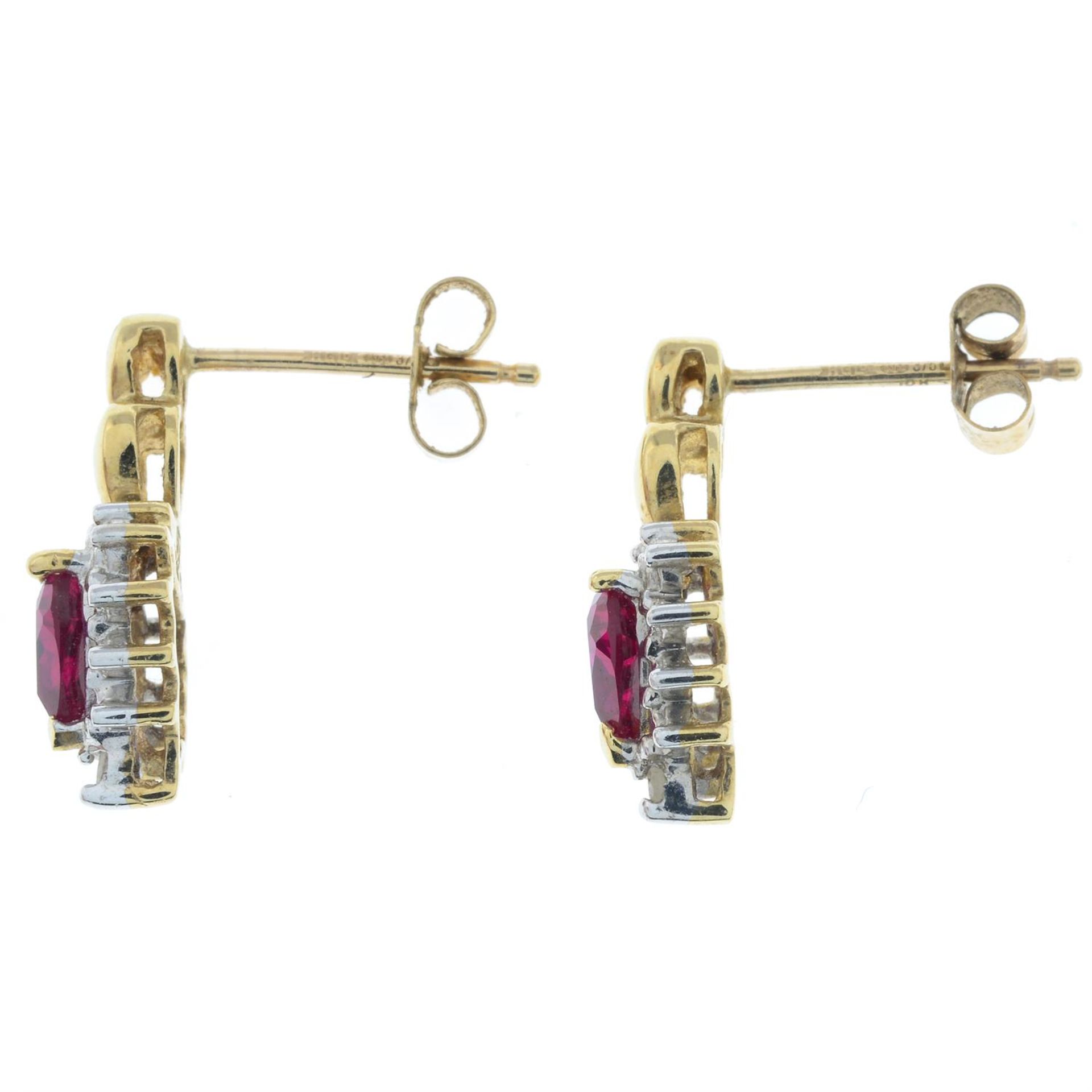 A pair of 9ct gold, synthetic ruby and diamond earrings. - Bild 2 aus 2