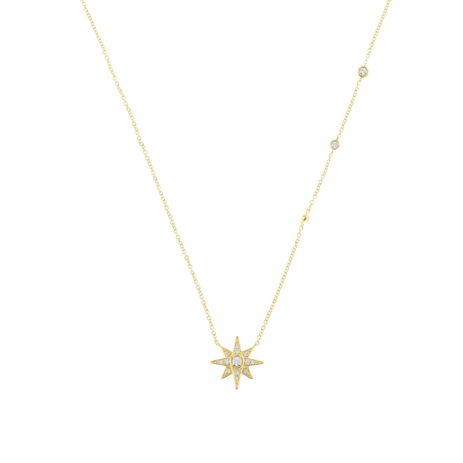 A trace-link necklace, with pave-set diamond start motif.