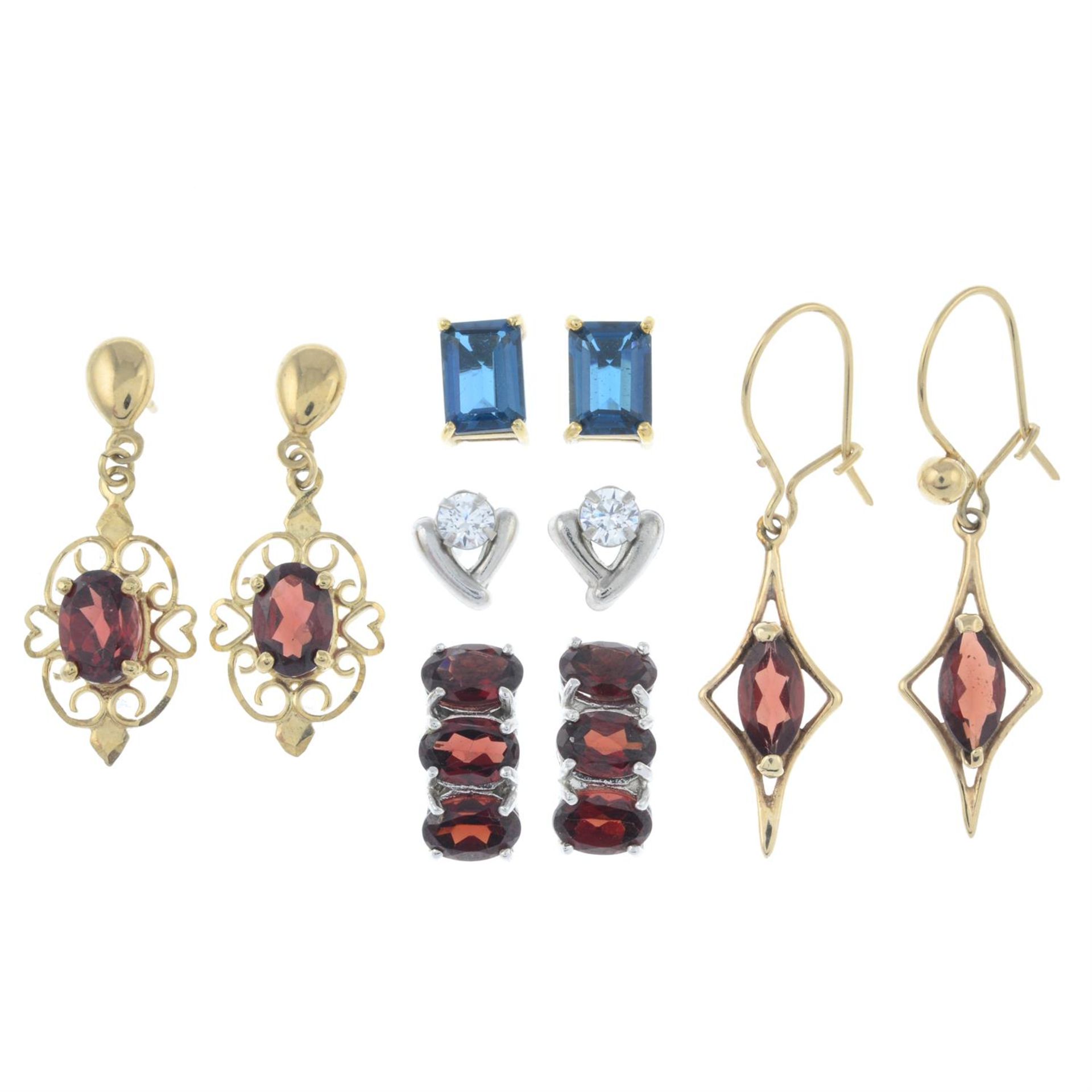 Five pairs of gem-set earrings.