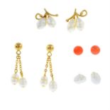 Three pairs of cultured pearl earrings and a pair of coral stud earrings.