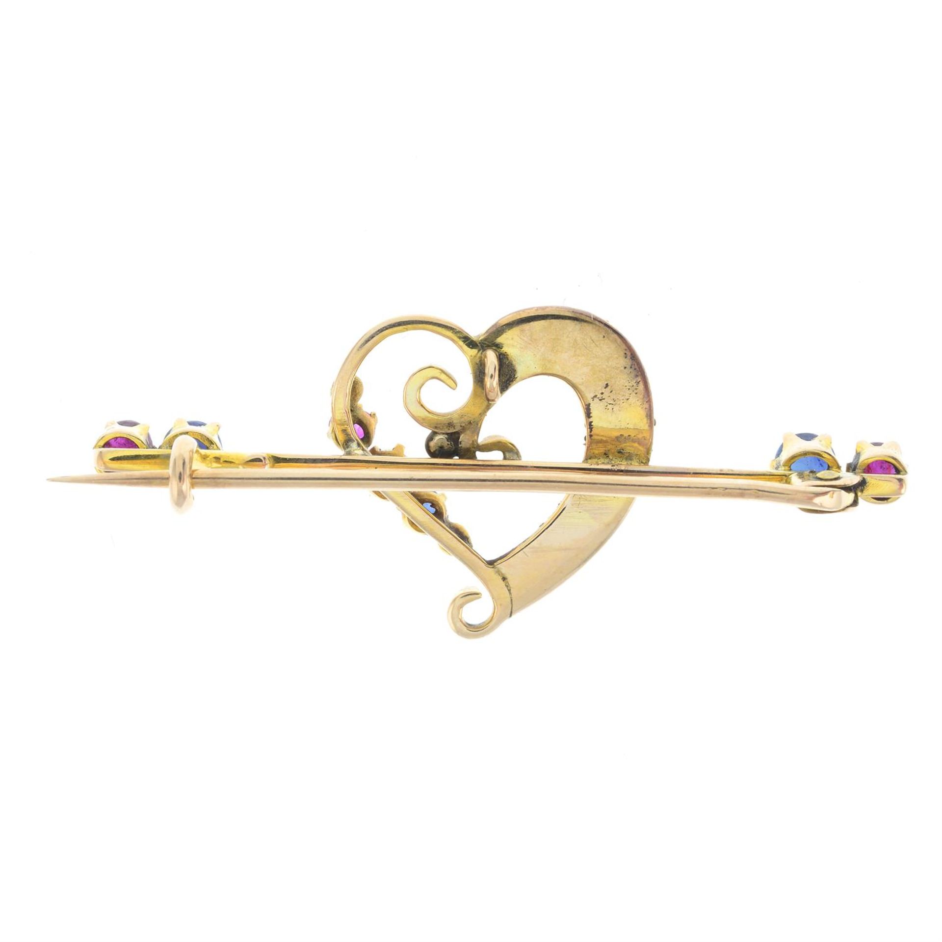 An early 20th century ruby, sapphire and split pearl heart bar brooch. - Image 2 of 2