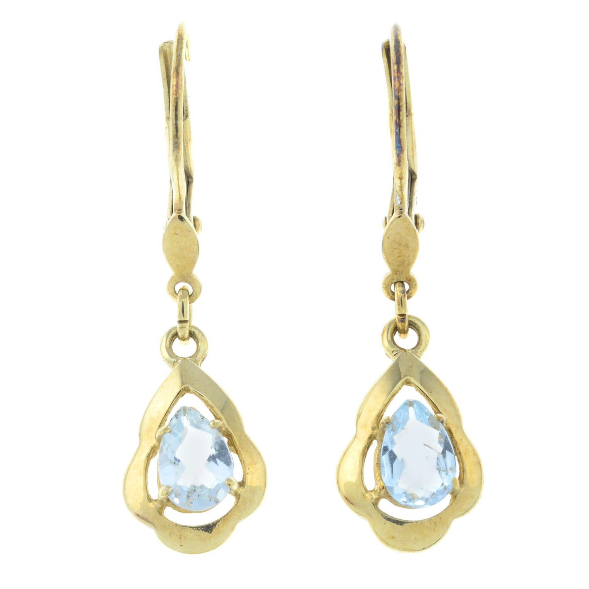 A pair of blue topaz drop earrings.