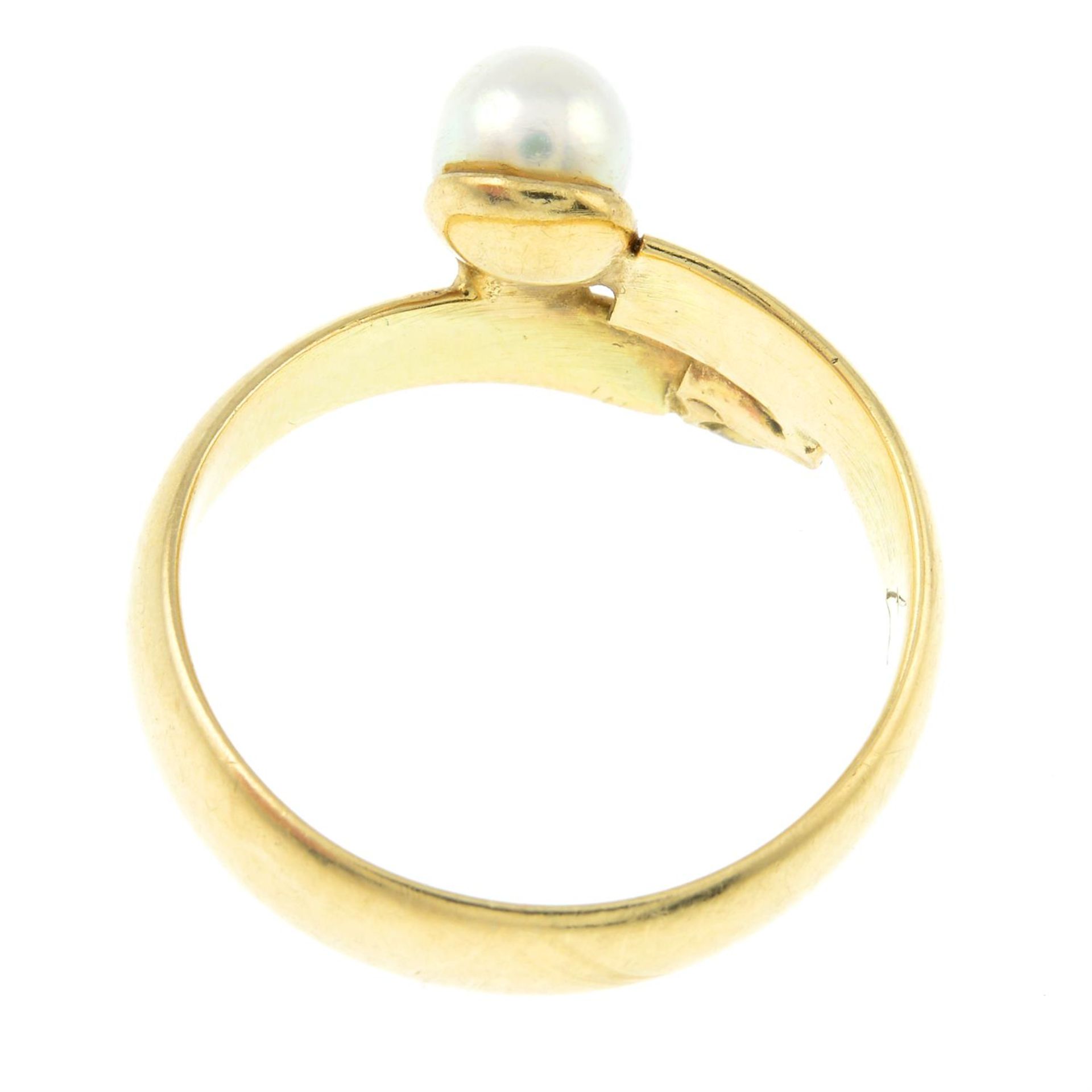 A sapphire and cultured pearl crossover ring. - Image 2 of 2