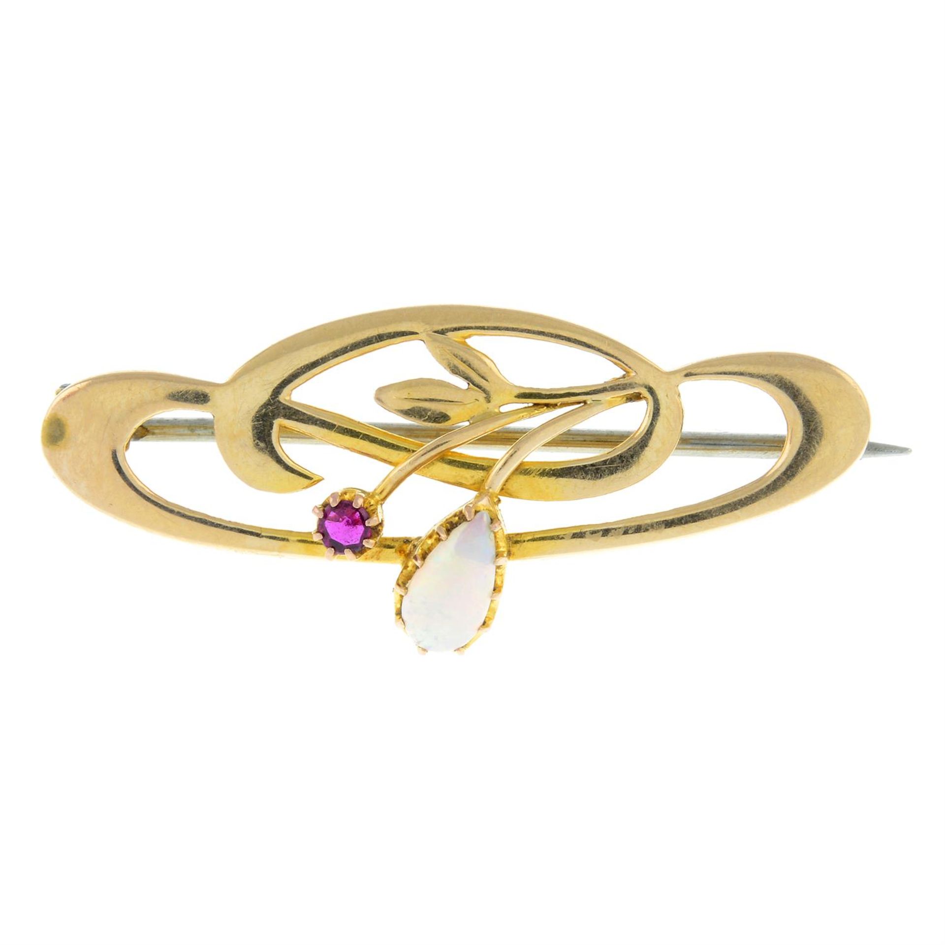An Art Nouveau 15ct gold ruby and opal brooch.