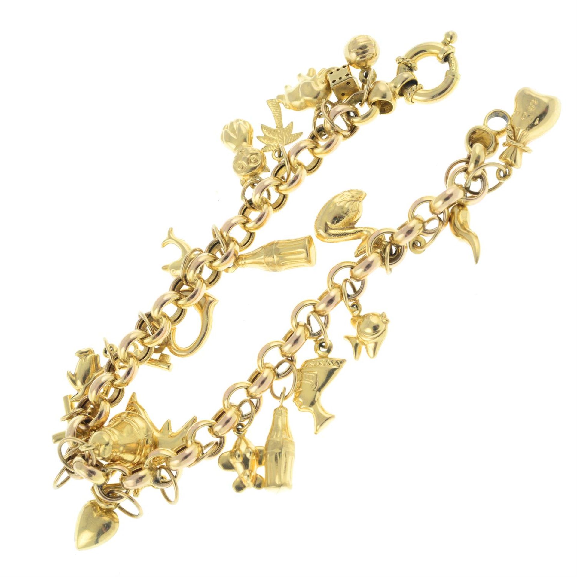 A 9ct gold charm bracelet, suspending twenty-three charms. - Image 2 of 2