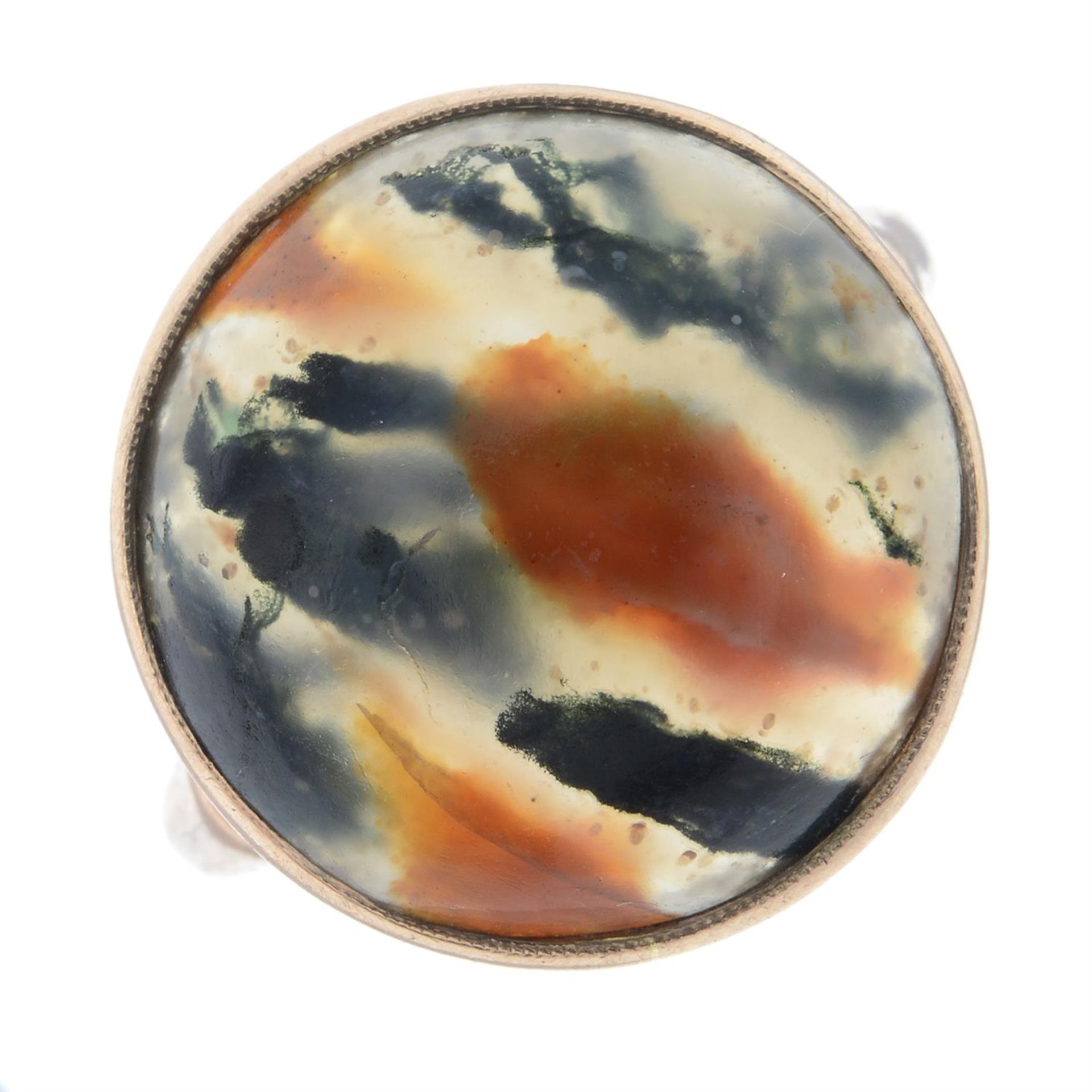 An early 20th century 9ct gold moss agate cabochon dress ring.