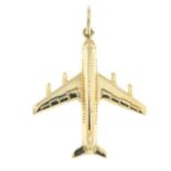 A 1970s 9ct gold aeroplane pendant.
