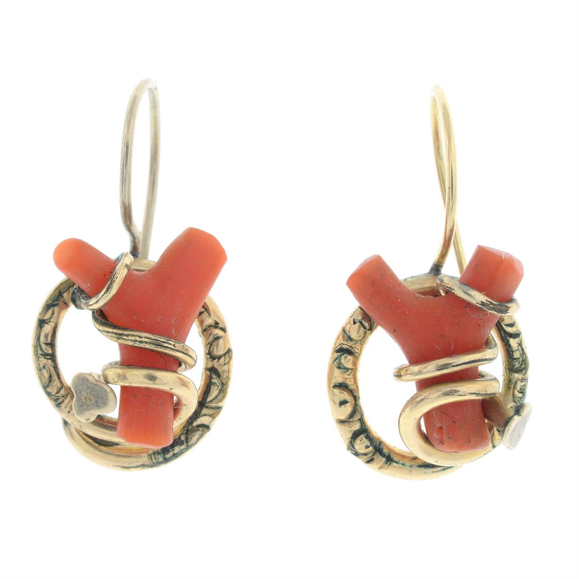 A pair of branch coral drop earrings.