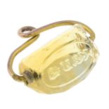 A citrine intaglio spinner fob, carved to depict a coronet on a ragged staff.