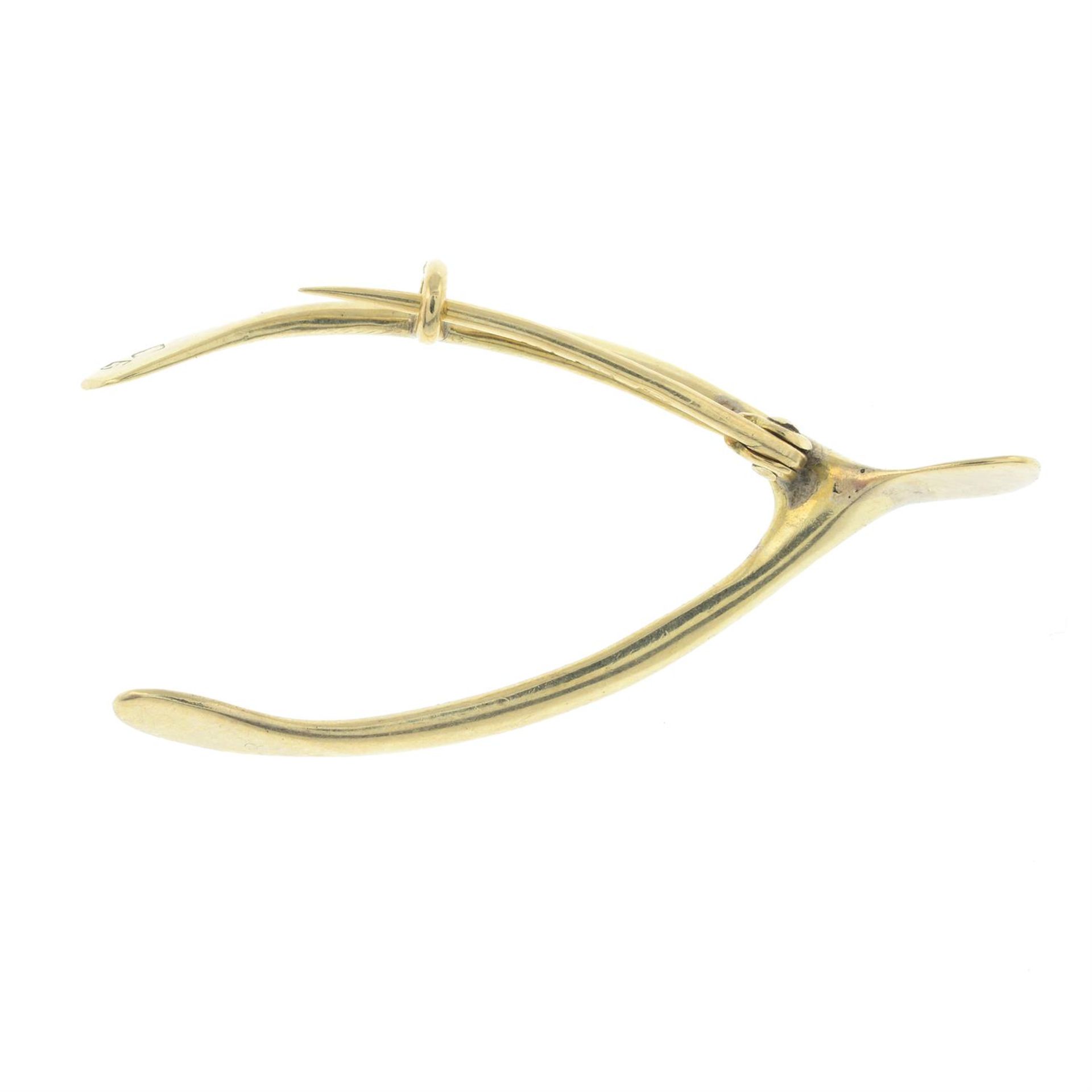 A wishbone brooch. - Image 2 of 2