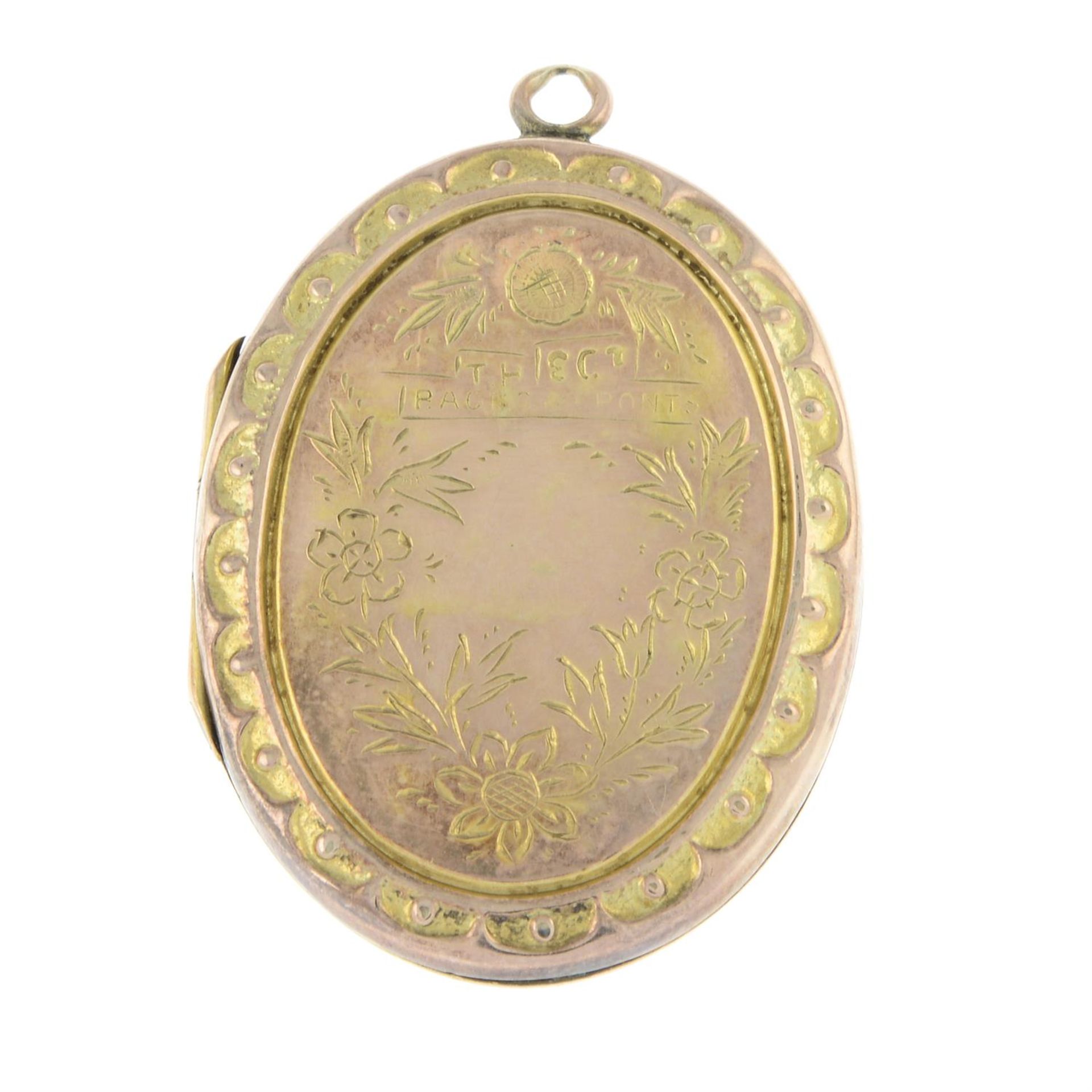 An early 20th century 9ct front and back floral locket pendant.