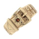 A 1970's 9ct gold garnet buckle ring.