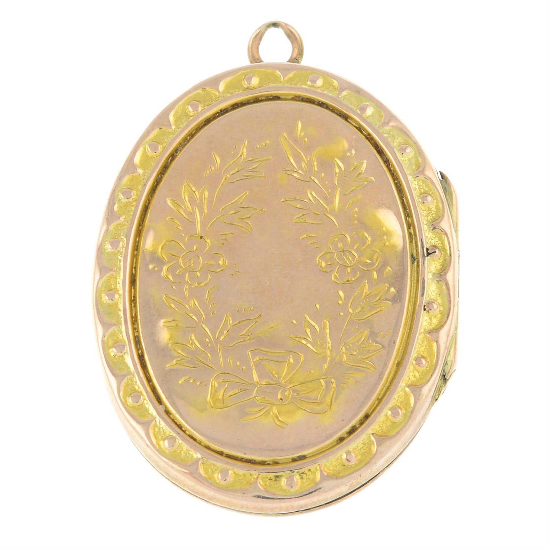 An early 20th century 9ct front and back floral locket pendant. - Image 2 of 2