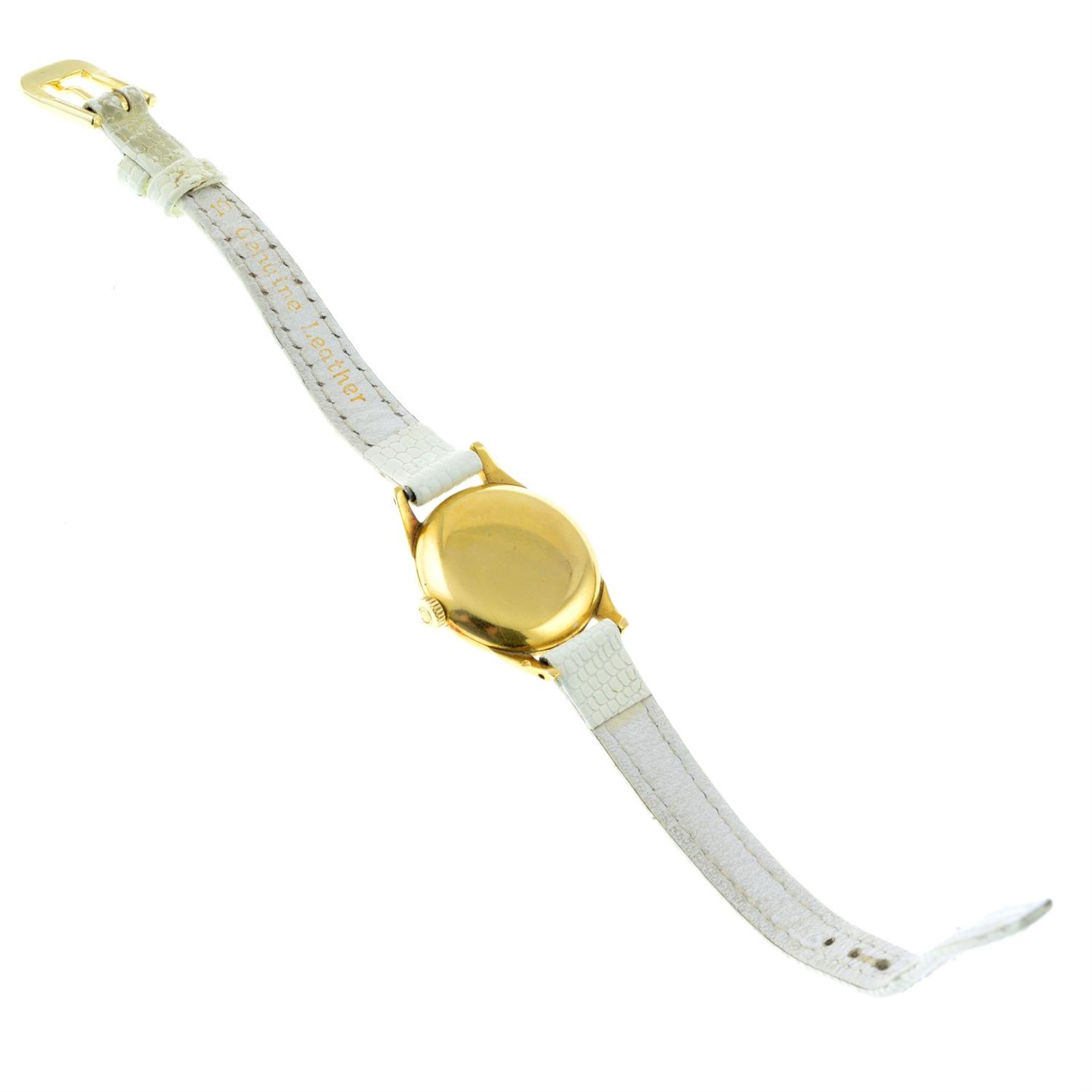 A ladies wristwatch, with white leather strap, by Omega. - Image 2 of 2