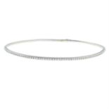 A brilliant-cut diamond eternity bangle.