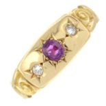 A late Victorian 22ct gold ruby and old-cut diamond three-stone band ring.