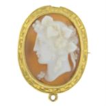 A late 19th century gold shell cameo brooch, carved to depict Bacchus, with greek key motif.