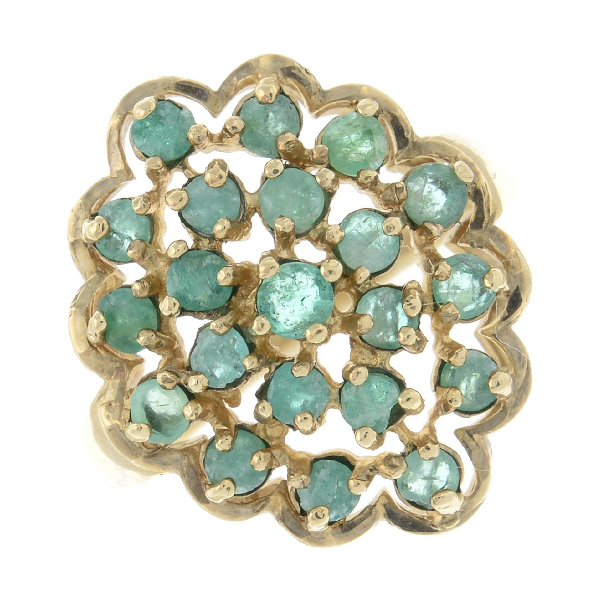 A 9ct gold emerald openwork cluster ring.