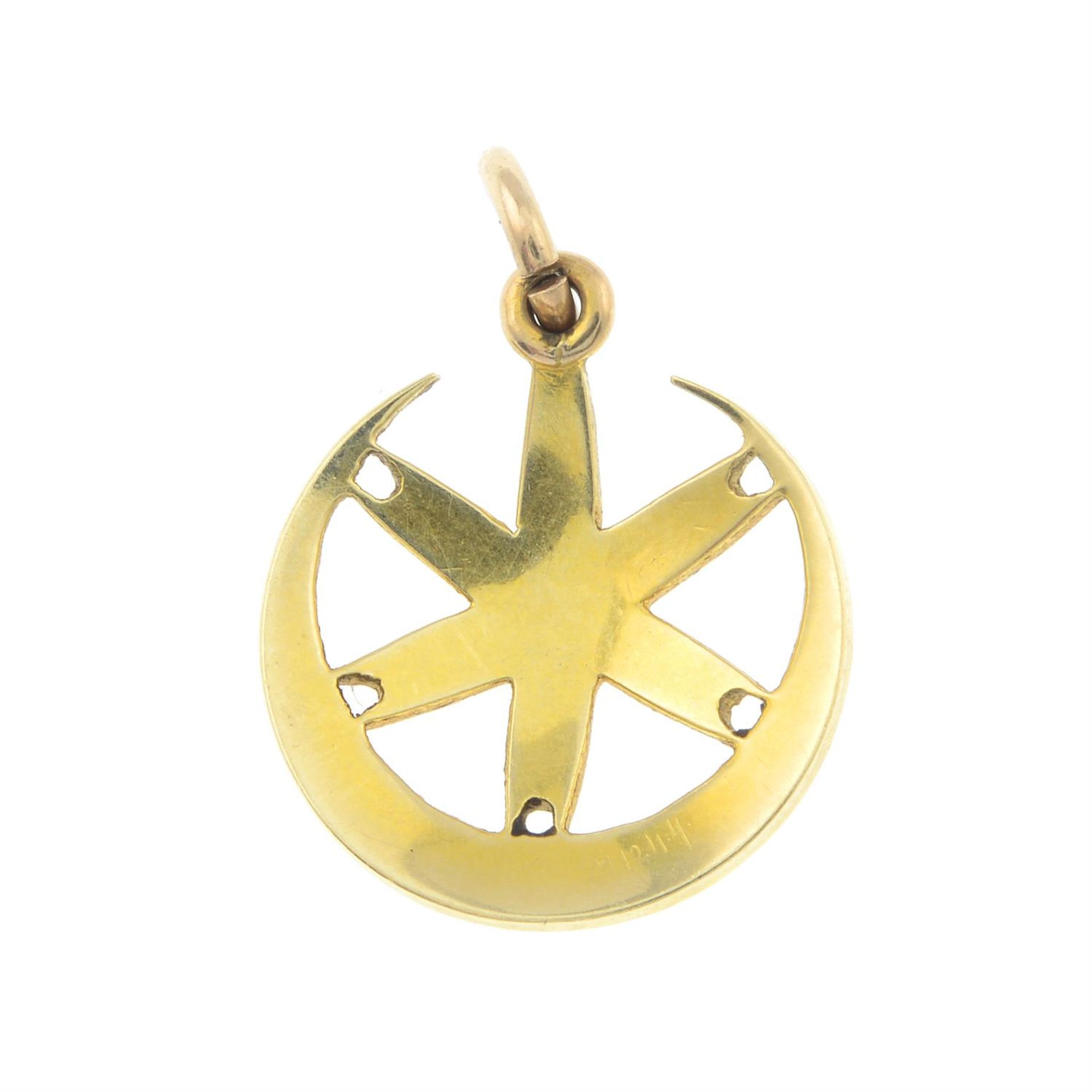 An early 20th century gold split pearl crescent moon and star pendant. - Image 2 of 2