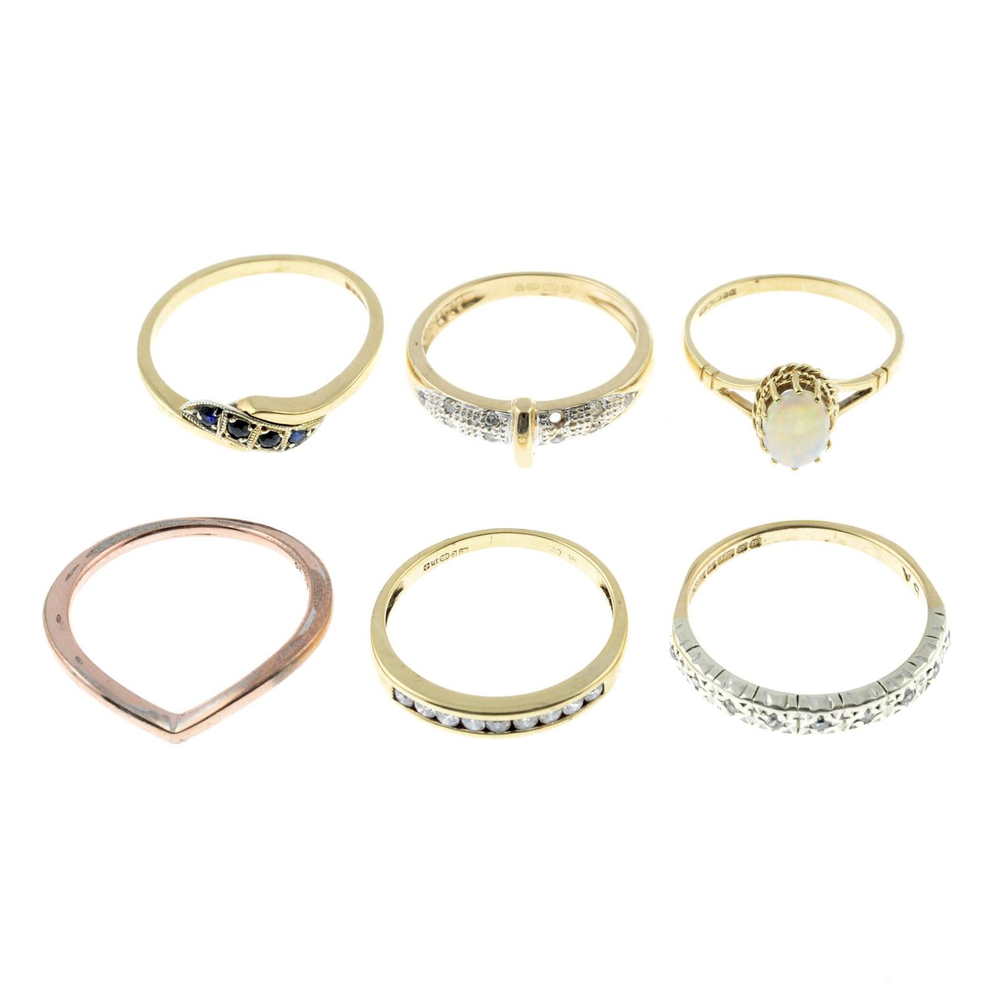 Six rings, to include a 9ct gold opal single-stone ring.