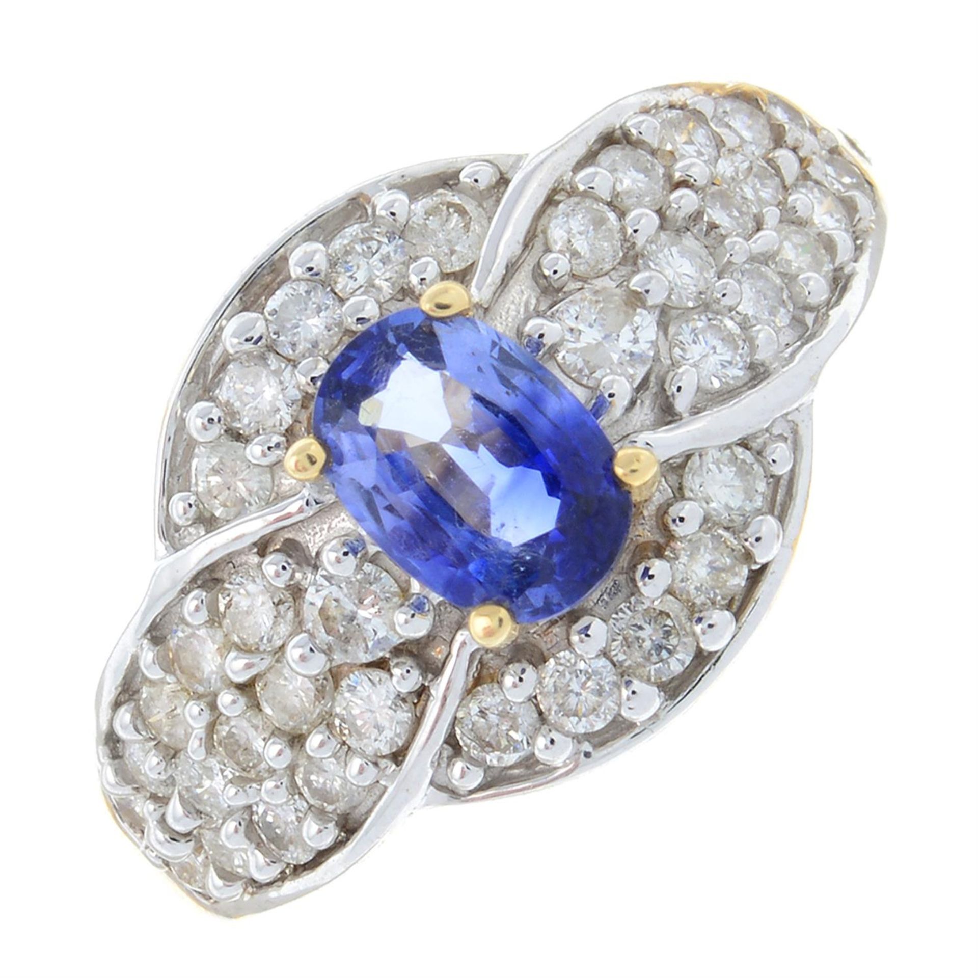 A sapphire and diamond dress ring.