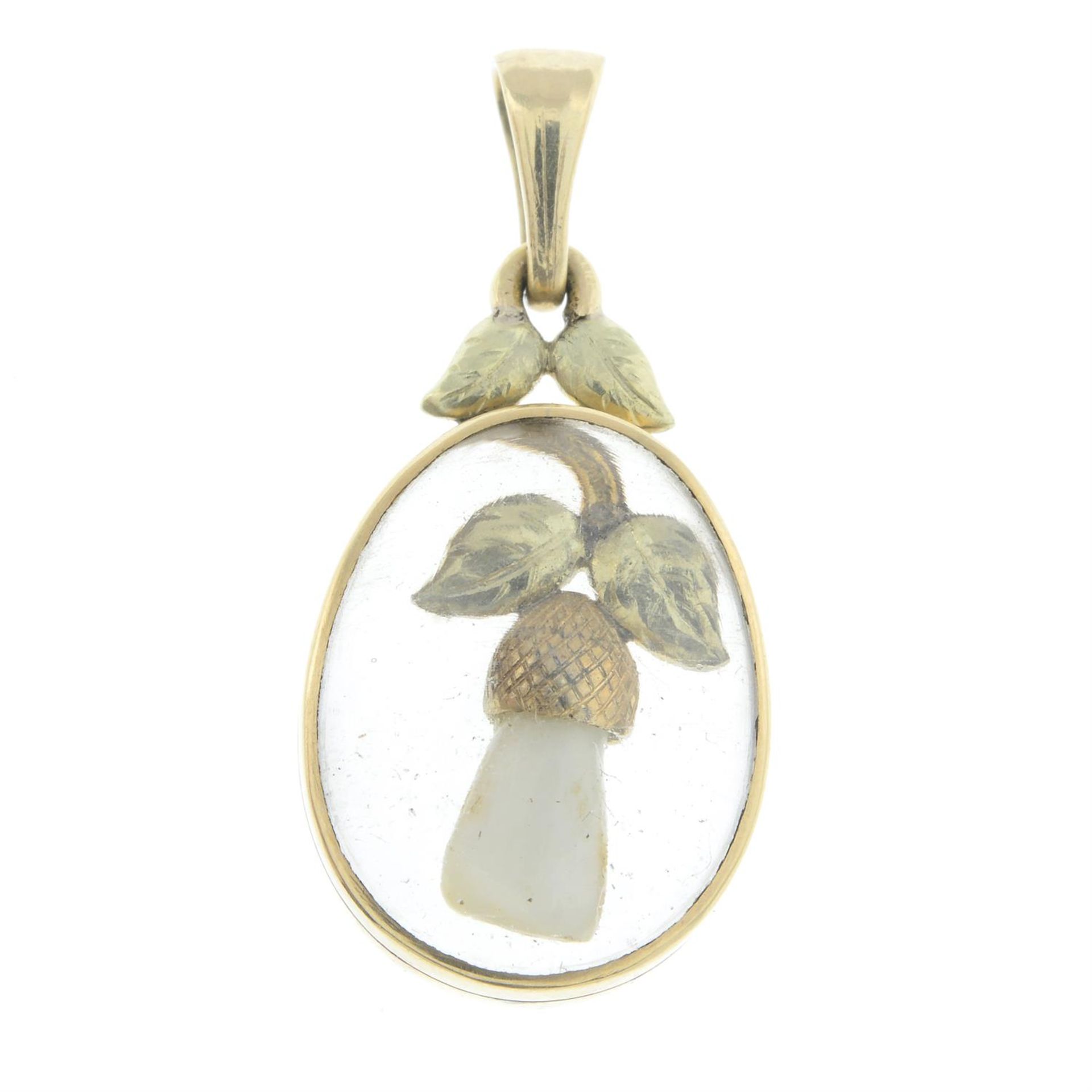 A Victorian tooth pendant.