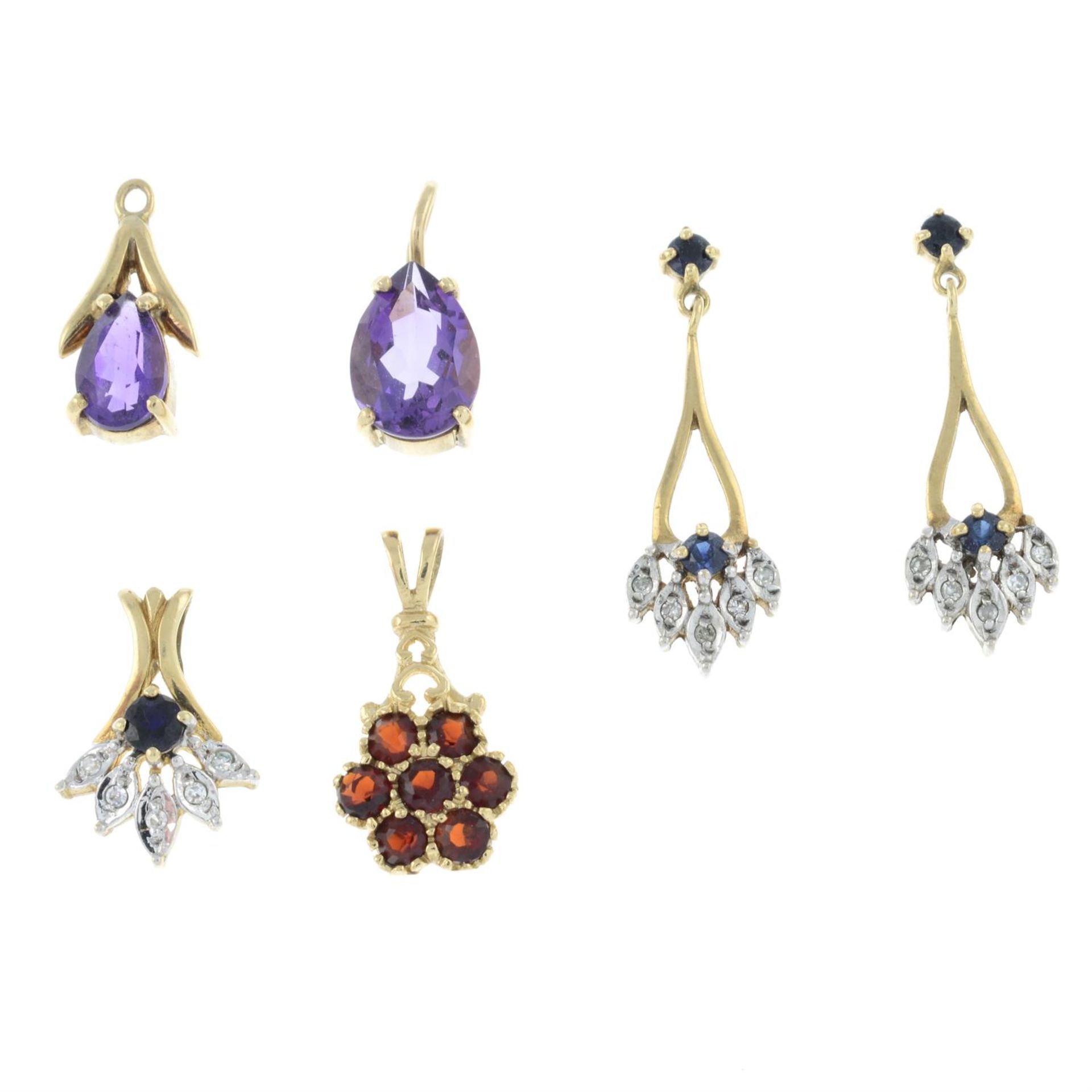 Four gem-set pendants, together with a 9ct gold gem-set pendant.
