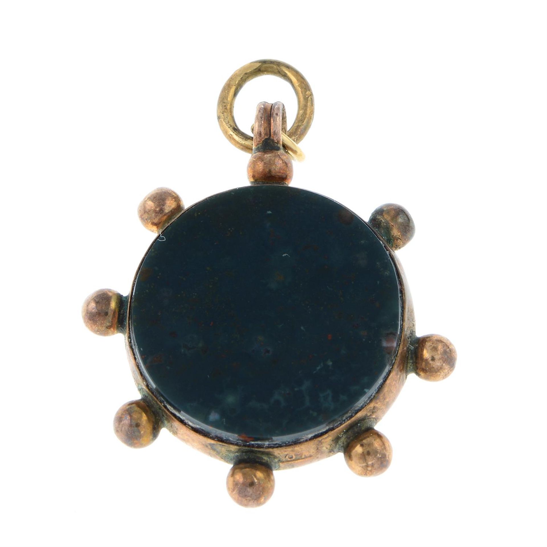 An early to mid 20th century gold bloodstone compass pendant/charm. - Image 2 of 2