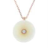 A jade and diamond floral pendant, with chain and free-moving cultured pearl pendant.