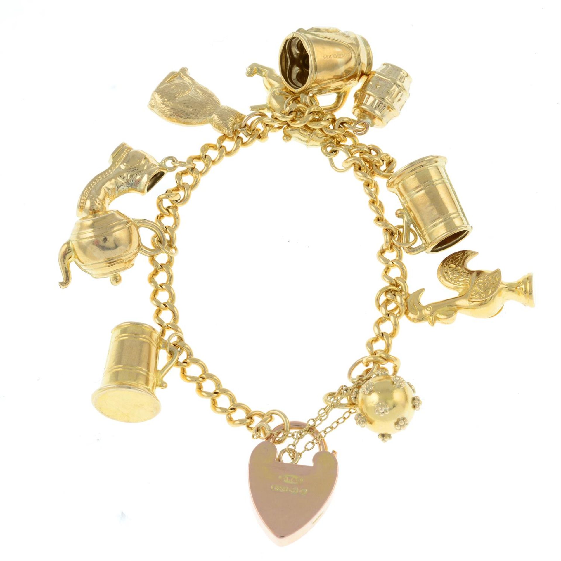 An 18ct gold charm bracelet, with 9ct gold heart-shape padlock clasp, suspending ten variously - Image 2 of 2