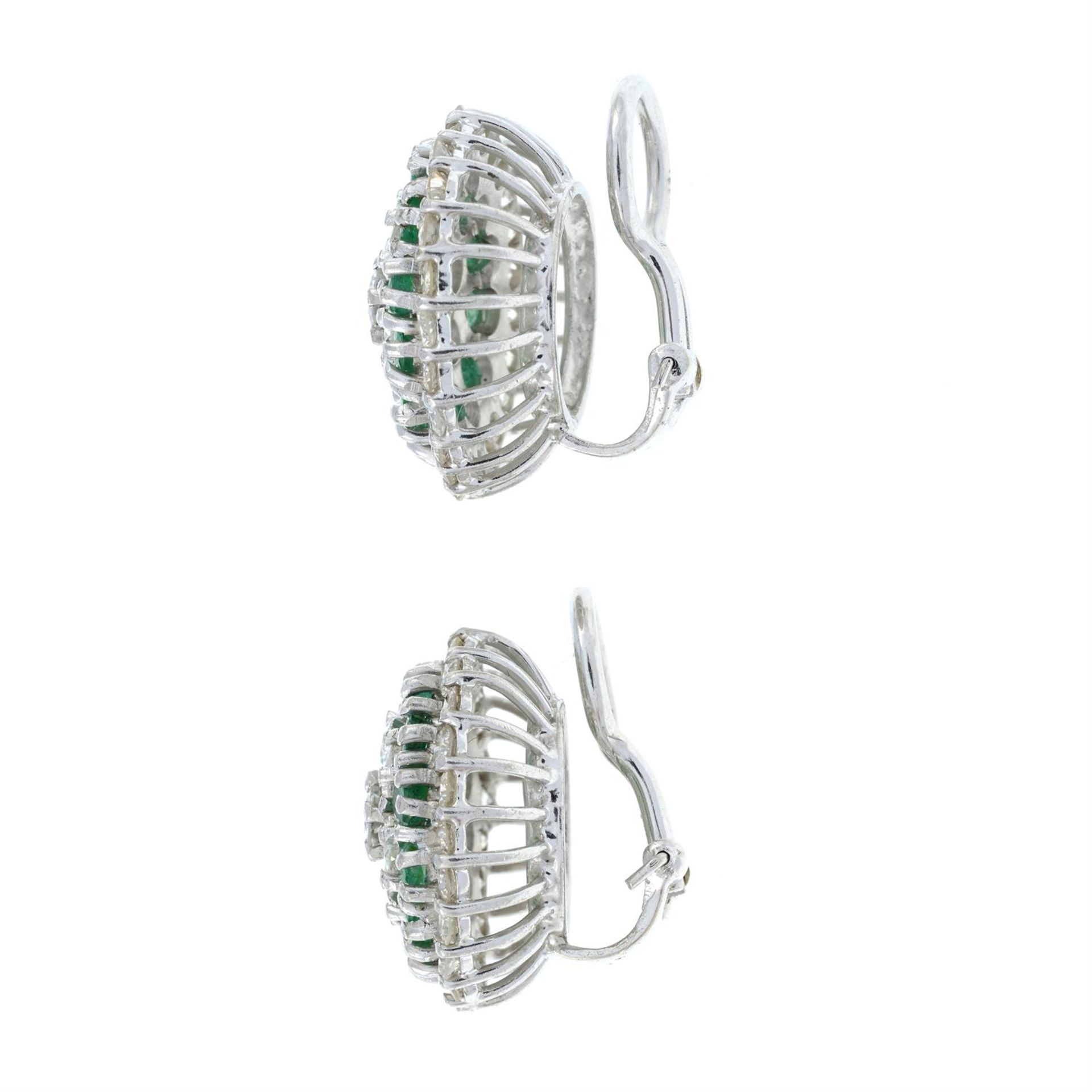 A pair of emerald and brilliant-cut diamond cluster earrings. - Image 2 of 3