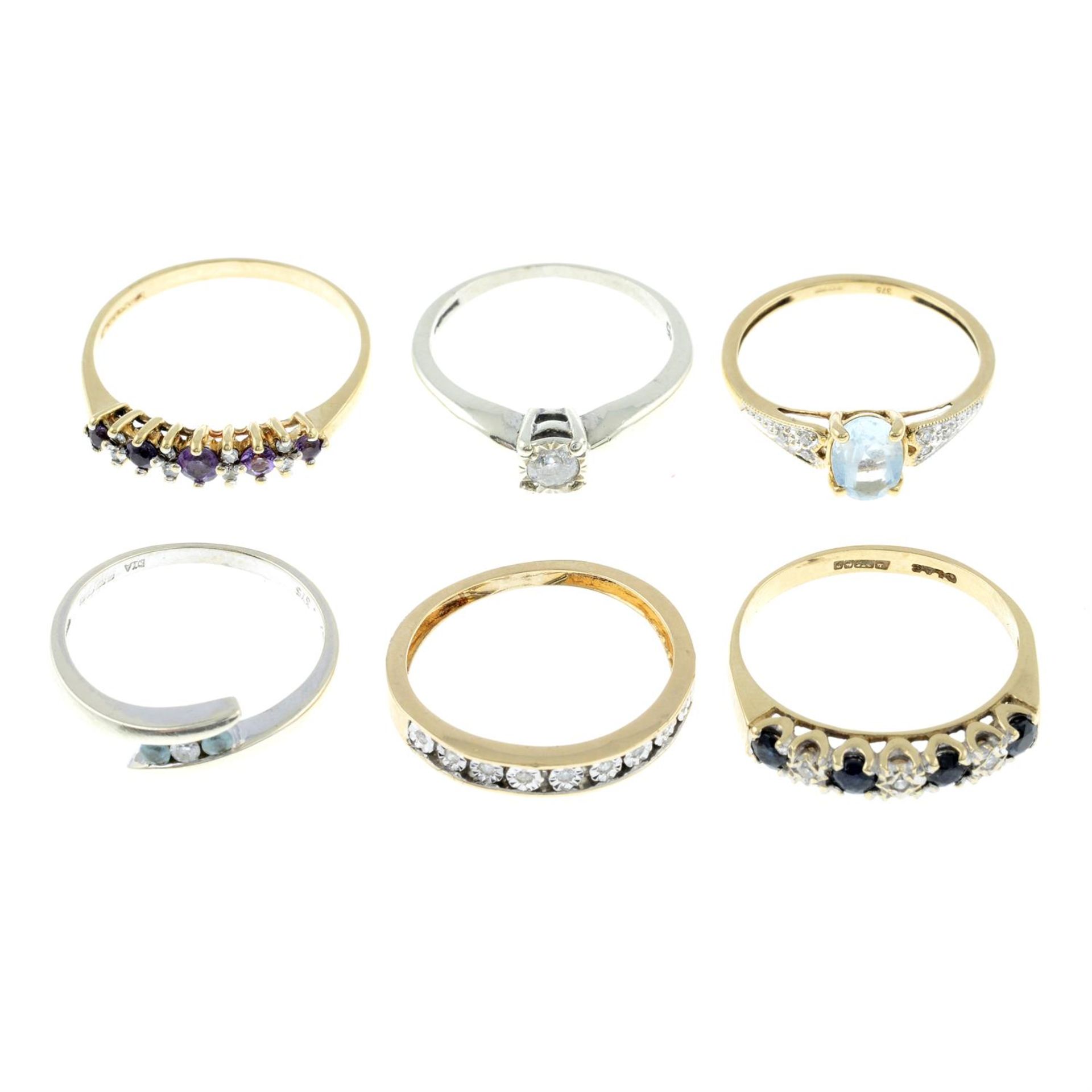 Six 9ct gold gem-set rings.