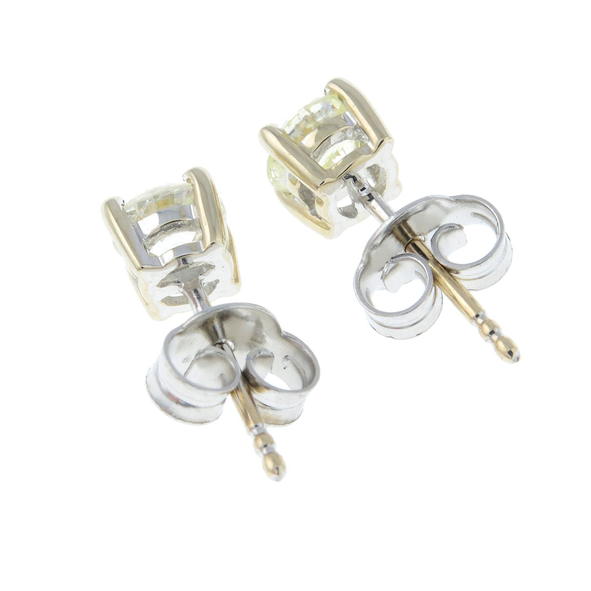 A pair of brilliant-cut diamond single-stone stud earrings. - Image 2 of 2