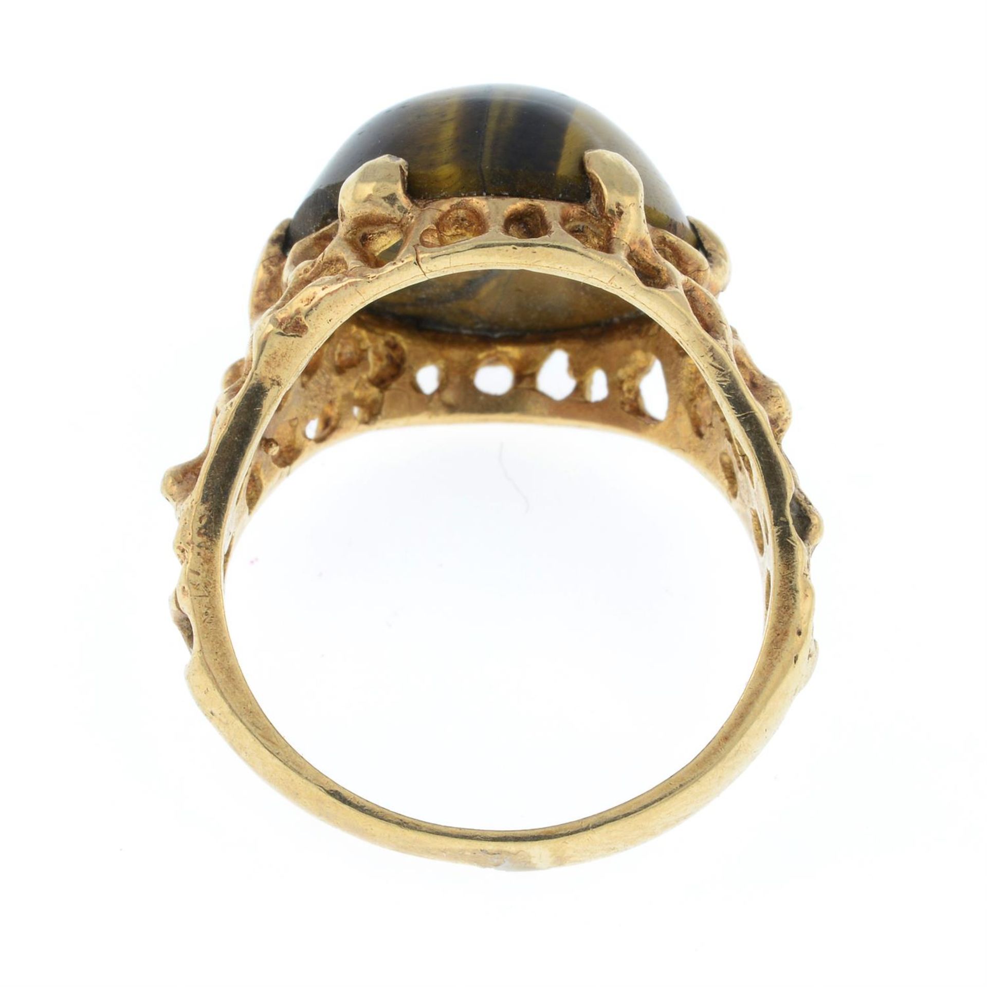 A 1970's 9ct gold tiger's eye single-stone abstract openwork ring. - Image 2 of 2