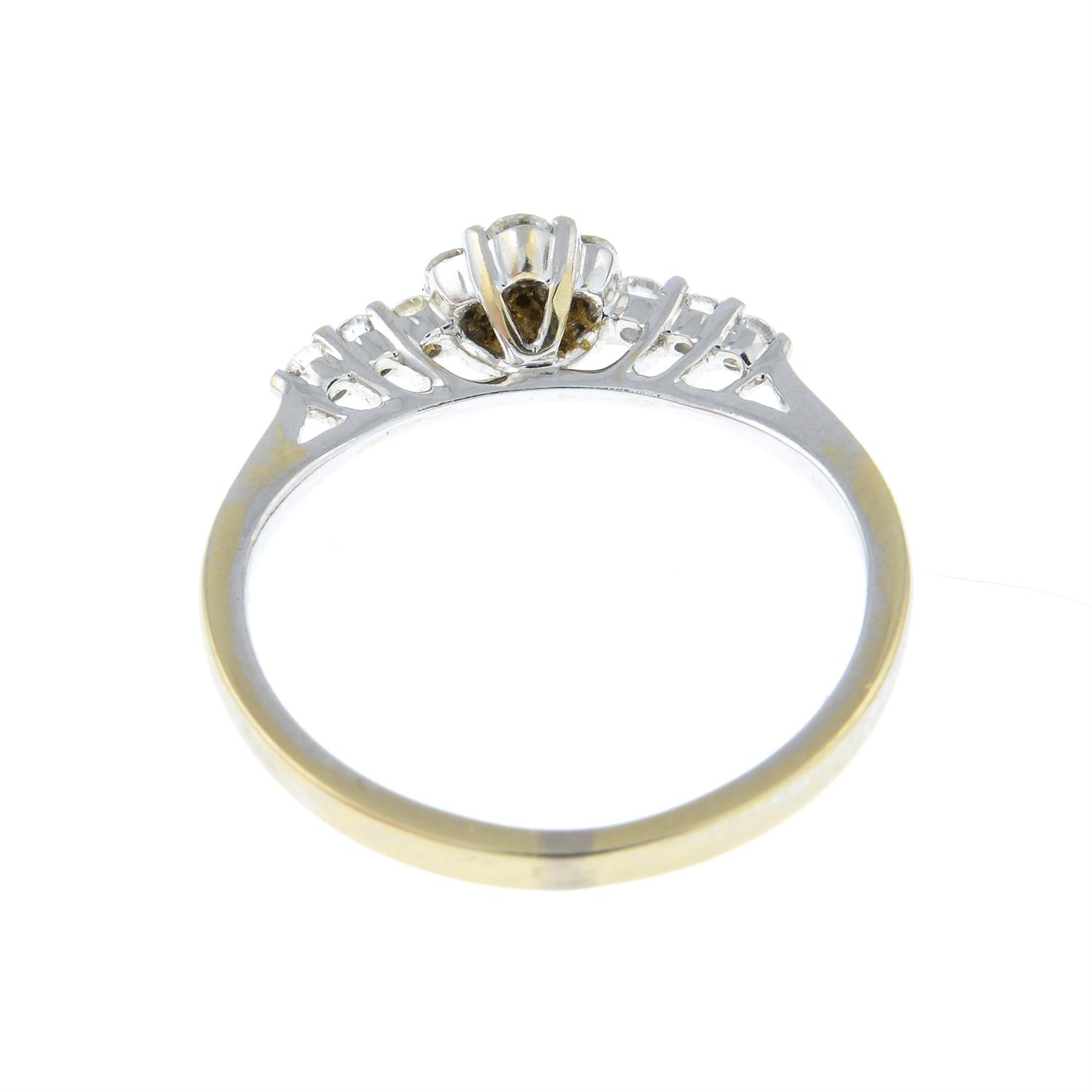 An 18ct gold brilliant-cut diamond floral cluster ring, with diamond shoulders. - Image 2 of 2