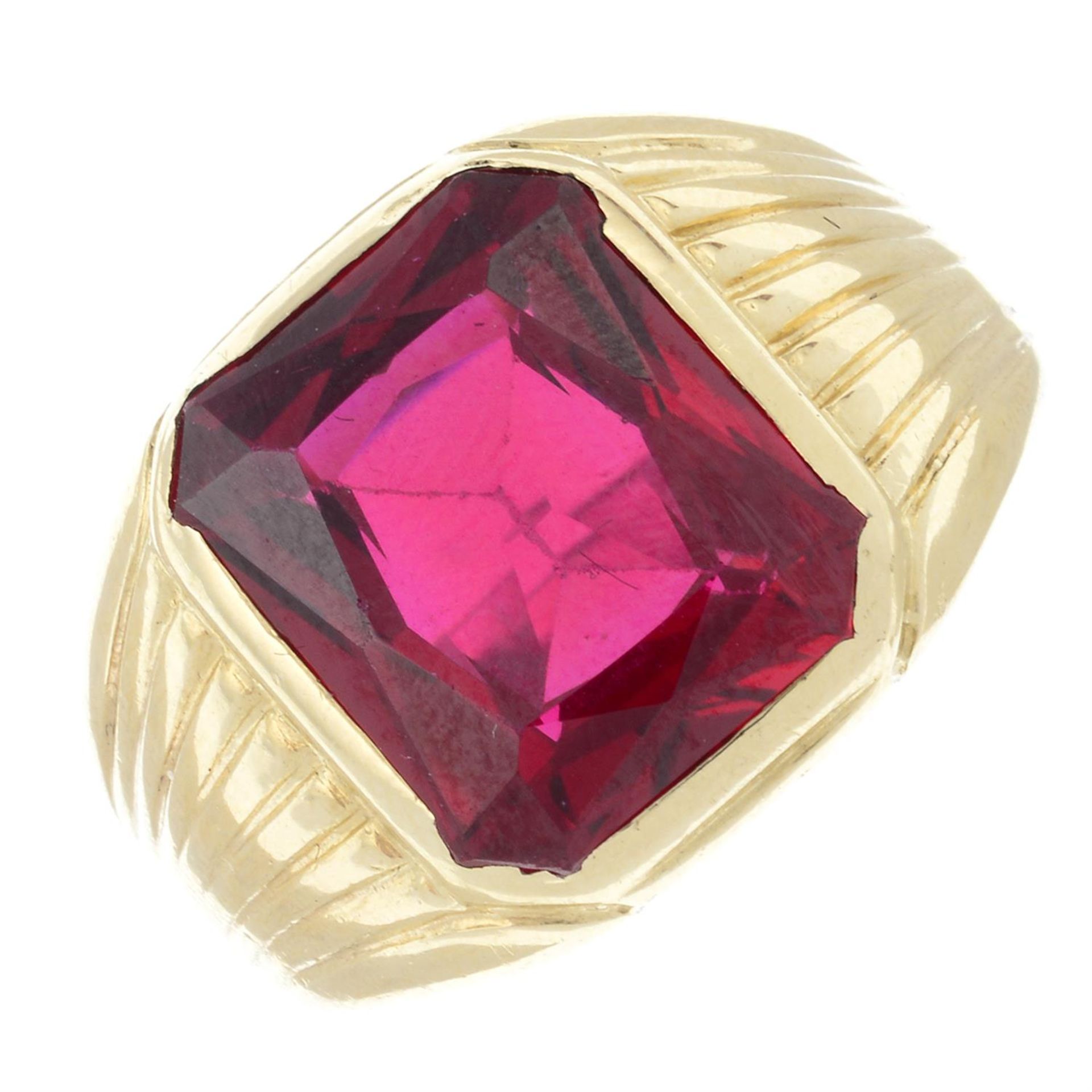 A synthetic ruby signet ring.