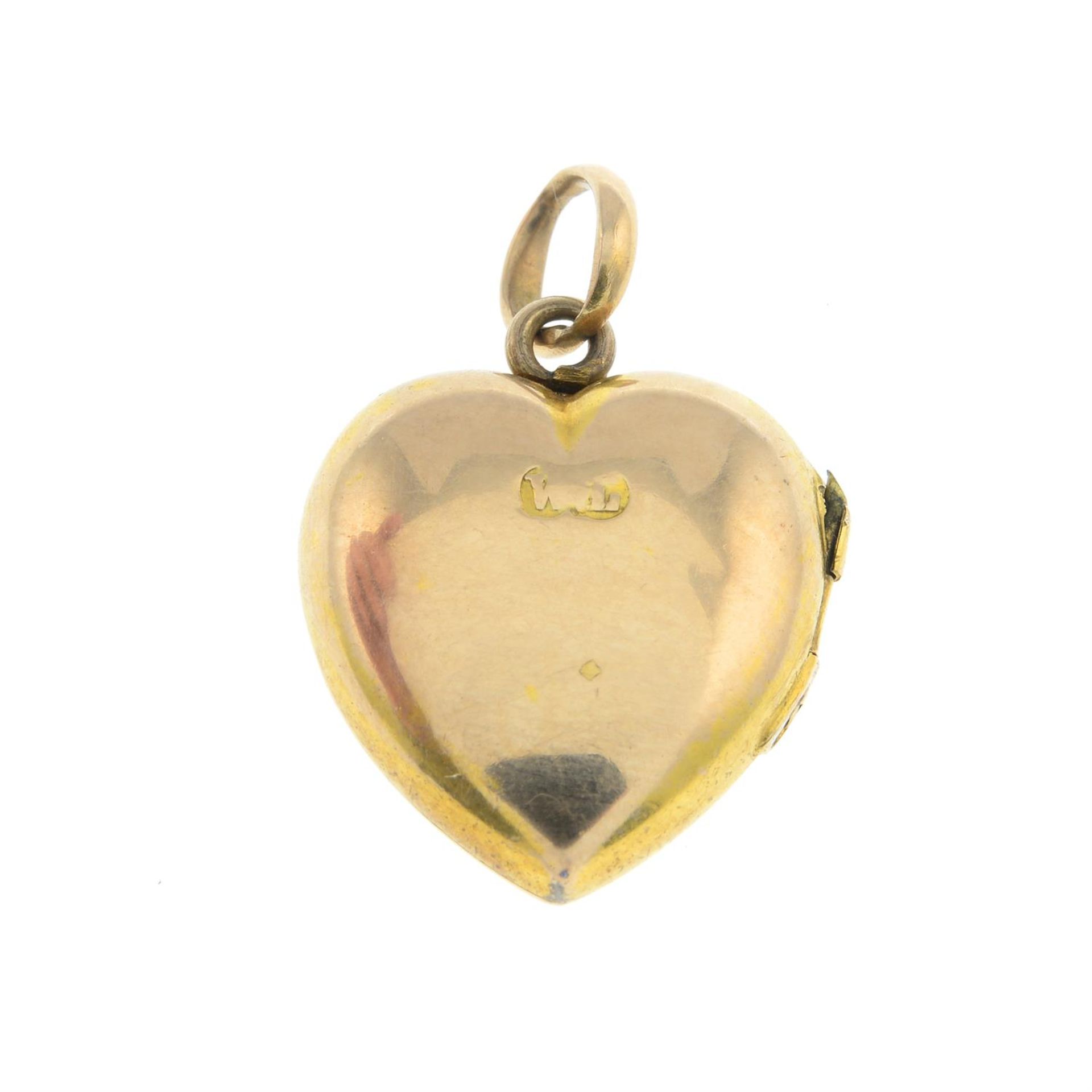 An early 20th century gold old-cut diamond heart-shaped locket charm/pendant. - Image 2 of 2