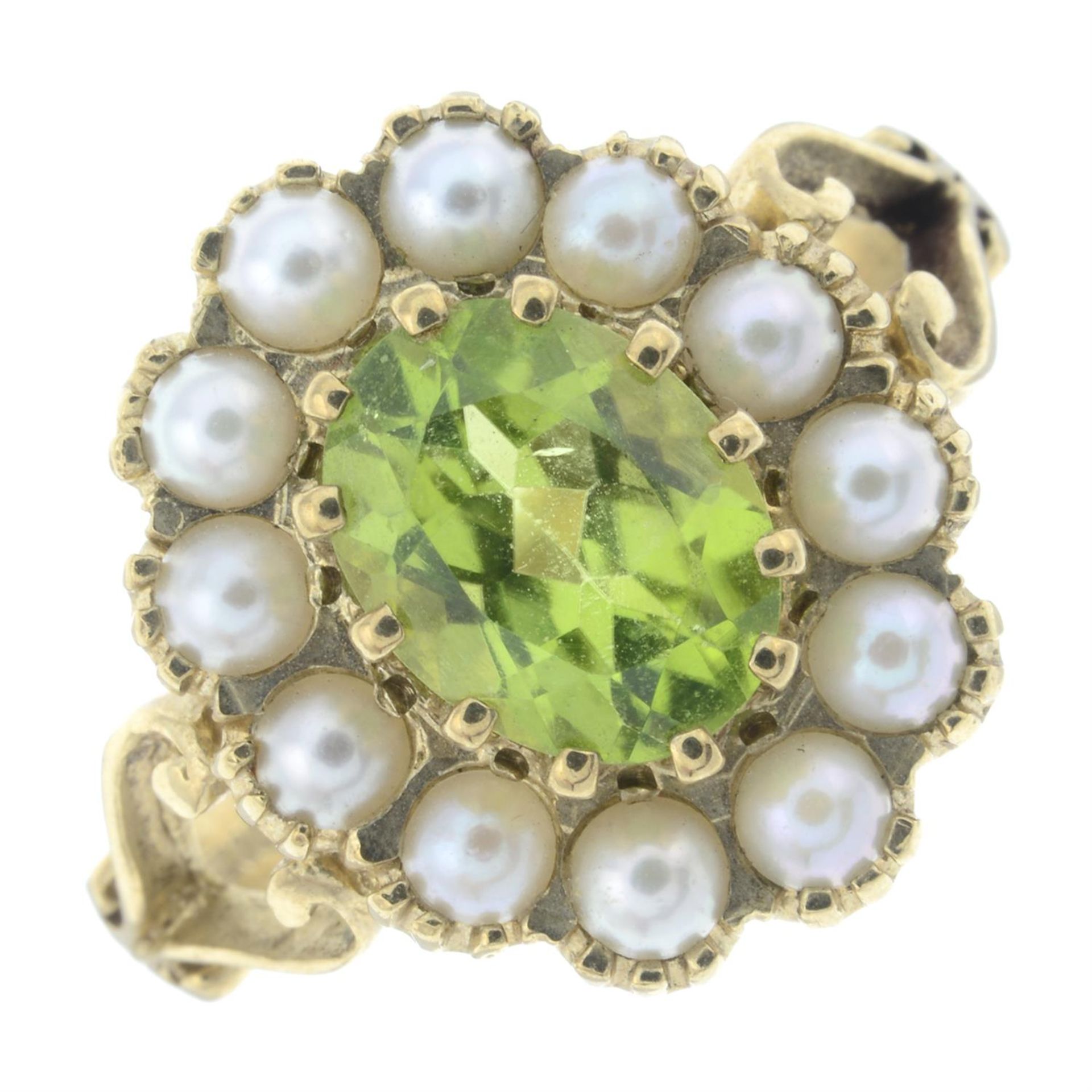 A 9ct gold peridot and split pearl cluster ring, with openwork shoulders.