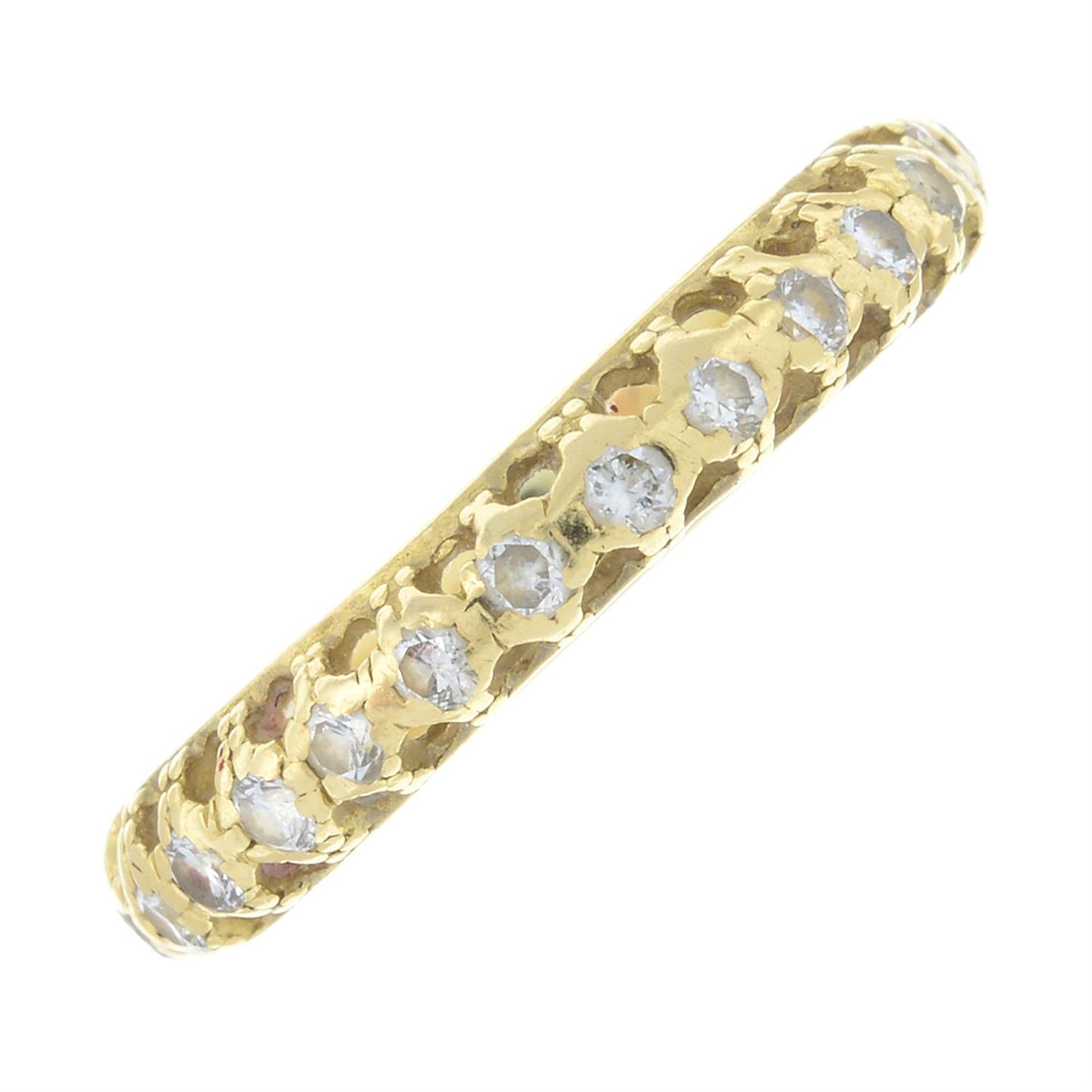An 18ct gold brilliant-cut diamond half eternity ring.