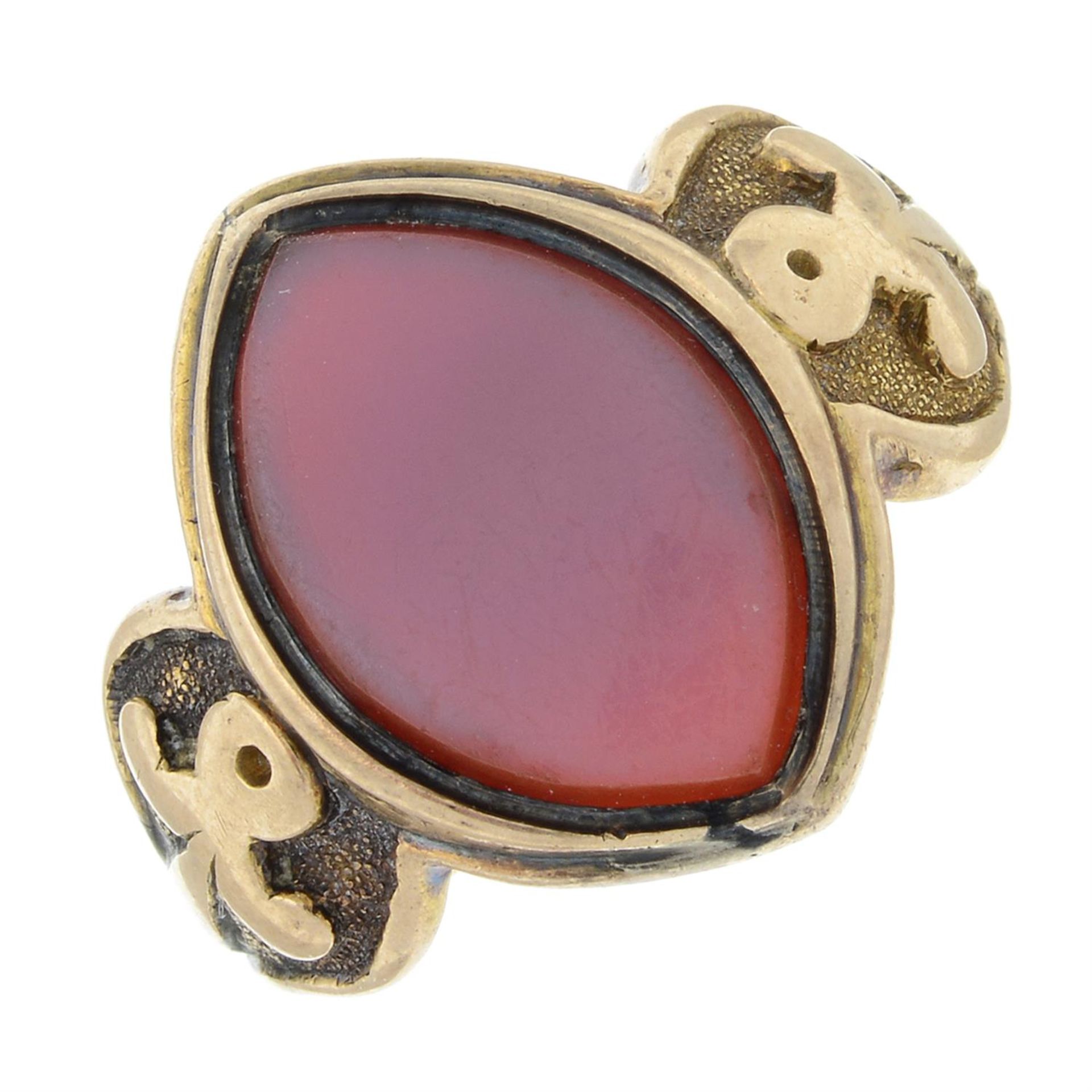 A late Victorian 15ct gold sardonyx signet ring, with ankh motif shoulders.